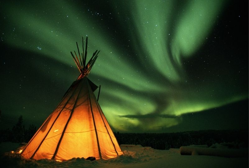 Image of a tee pee with northern lights