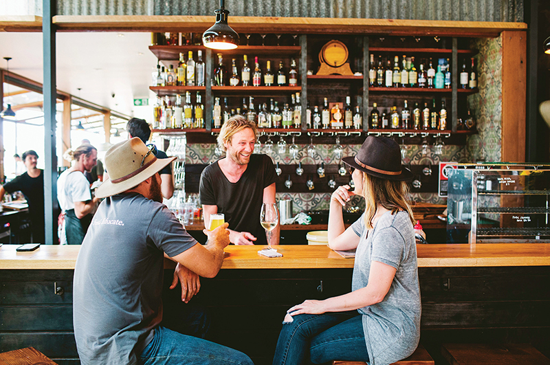 Grabbing coffee at Three Blue Ducks, Byron Bay