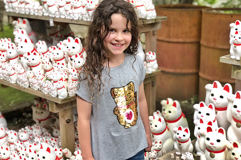 Girl at Gotokuji Temple in Tokyo