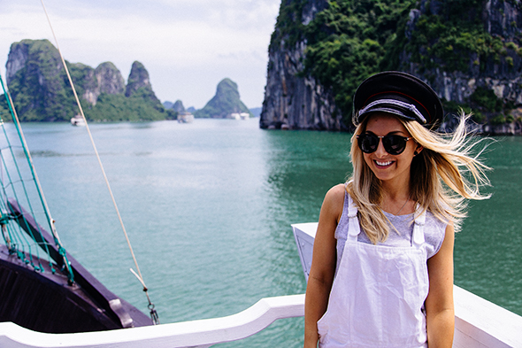 female traveller smiling in halong bay
