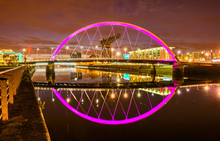 Glasgow's Squinty Bridge illuminated at night