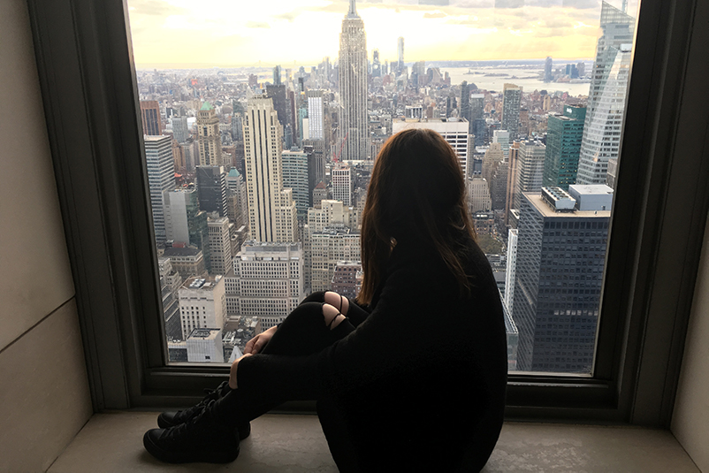 female at top of the rock, nyc