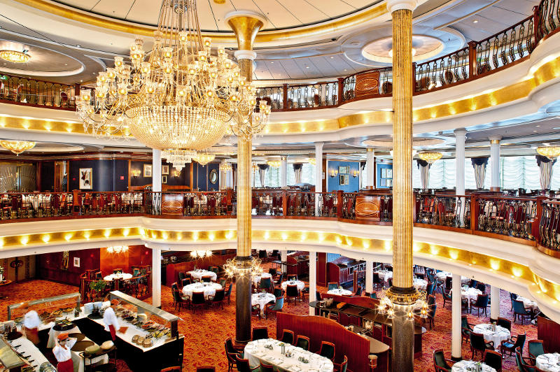 The elegant main dining room on board Royal Caribbean's Voyager of the Seas cruise ship.