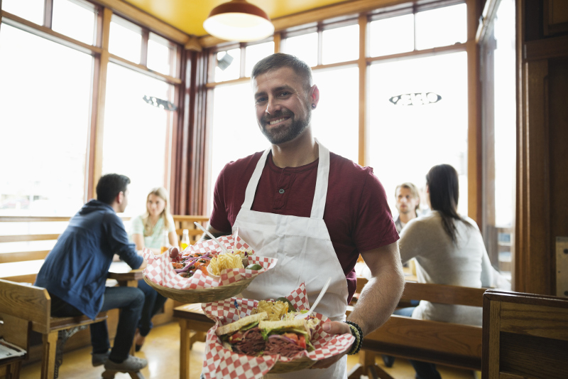 American waiter, working for tips