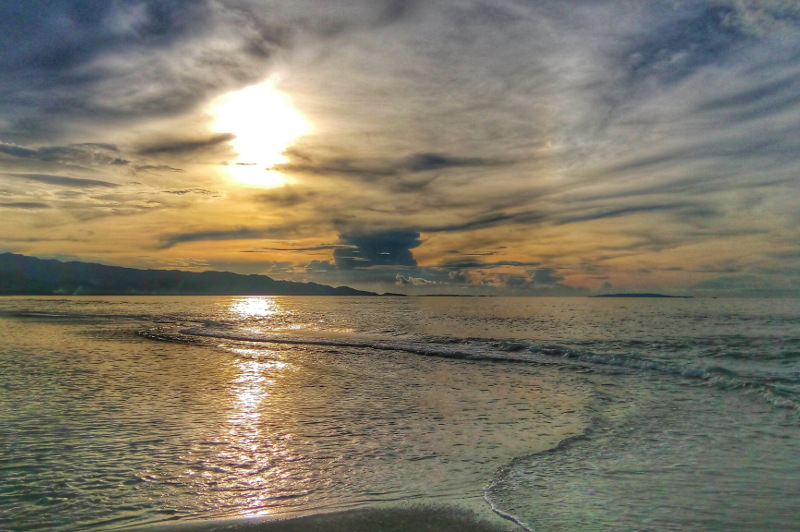 A dreamy coastal sunset in Malay.