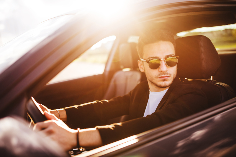 A young man behind the wheel